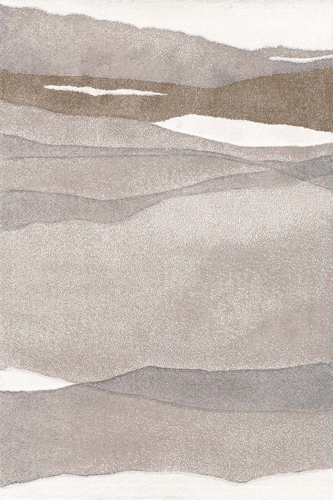 Sintelon tepih Vegas Home 54EBE Sintelon tepih Vegas Home 54 EBE – bež, sivi i smeđi tonovi u talasastom dezenu, inspirisan prirodnim pejzažima.