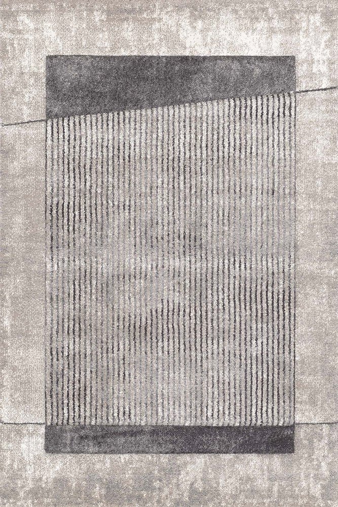 Sintelon tepih Vegas Home 67EME Sintelon tepih Vegas Home 67 EME – sivi tonovi sa pravougaonim okvirom i vertikalnim linijama.